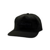 Debrouillard black hat with black lettering and black rope