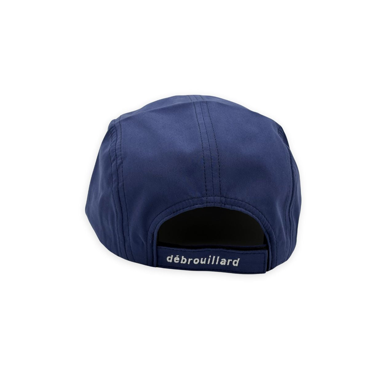 Rear view of blue five panel hat with white débrouillard embroidery across closure strap